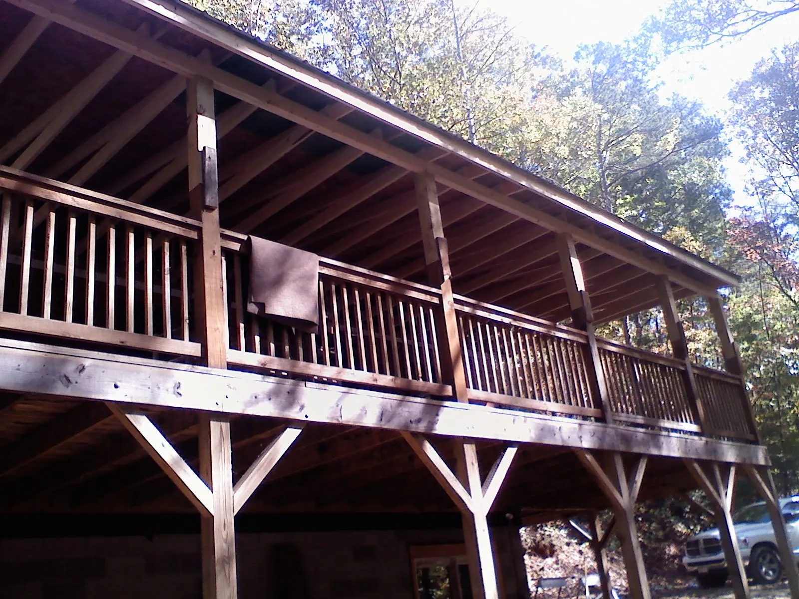 Timber framing under a new elevated porch and deck — Roof Leak Repair in Gobles by Roofing Brothers